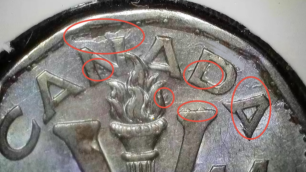 1944 Canadian five-cent coin with red circles highlighting irregular lettering contours and apparent secondary ridges