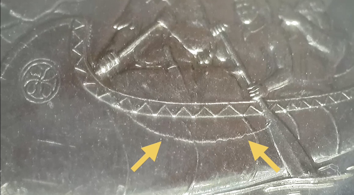 1999 May Canadian quarter close-up of the foreground beneath the canoe