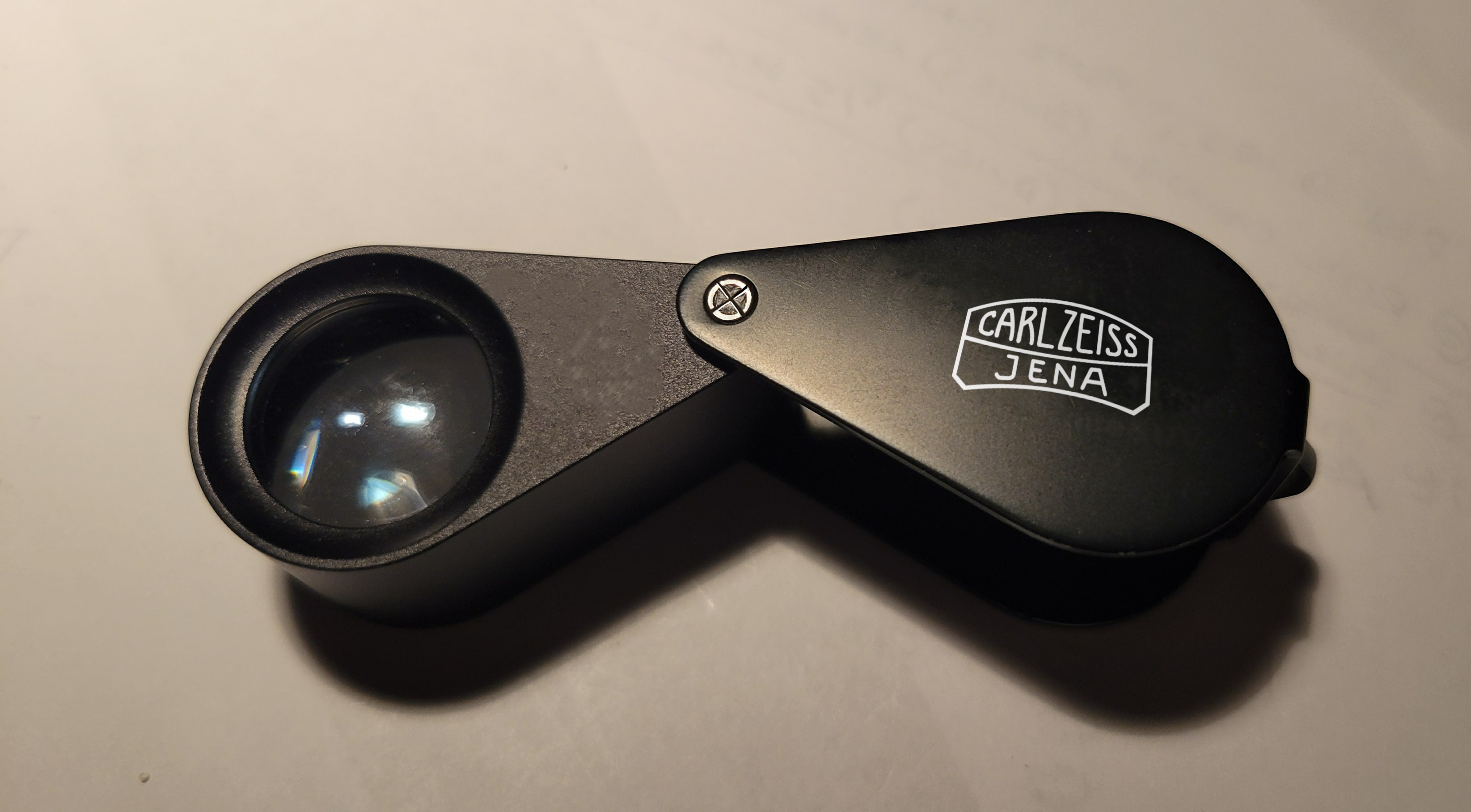 Carl Zeiss Jena 10x Hastings Triplet loupe used for coin examination